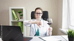 Doctor refuse alcohol, shows thumbs down to glass of wine, medical treatment, liver cancer prevention, rejection