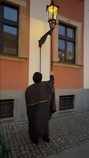 The Lamplighter of Wrocław 🔥 A living tradition in Poland’s old town #Wrocław #poland