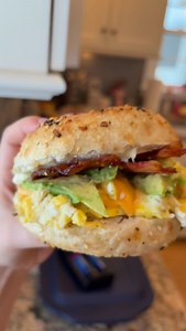 Holy Bagel 😍 Nothing like a loaded everything bagel to start the snow day. Im a huge fan of @frequencysourdough the sourdough bagels are AMAZING! 🥯 loaded with Eggs, cheese, mayo, bacon, & avocado! #sourdough #bagels #eatlocal #smallbusiness #snowday | Ashley Huff