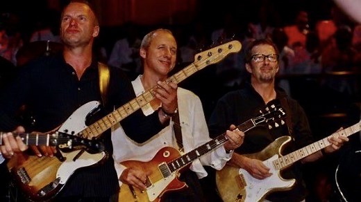 4.6M views · 25K reactions | Mark Knopfler, Eric Clapton, Sting & Phil Collins - Money for Nothing - Live 1997 | Rock Music Legacy | Facebook