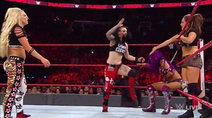 It's an all out BATTLE as Ember Moon and Sasha Banks take on The Riott Squad on WWE Raw! | WWE