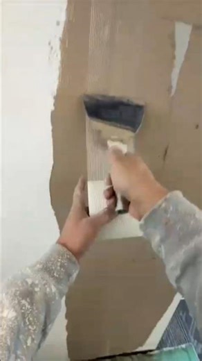 preparing wall for tiling using a professional notched trowel technique