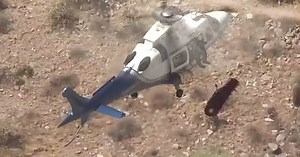 Helicopter rescue spins out of control