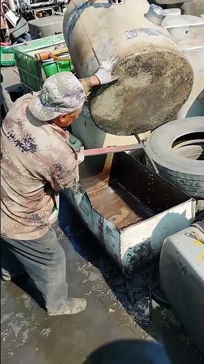 The process of draining oil from a fuel tank