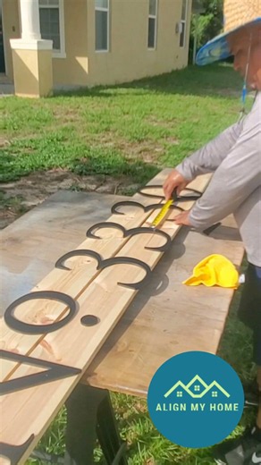 Installing New House Numbers Over the Garage