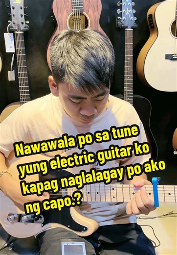 Paano I-tune ang Electric Guitar na may Capo