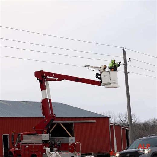 Ever wonder what happens when a structure is too tall to pass under a power line? Recently, four barns we relocated just down the road, and before they could move safely underneath a section of overhead line, our crews worked alongside the movers to temporary lift the line and maintain proper clearance. Once the barns cleared the area, the line was secured and returned to normal. It’s not something most people see, but coordination like this helps ensure moves happen safely while keeping the sys