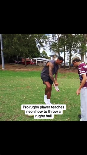 Pro Rugby Player Teaches Neon How to Throw a Ball