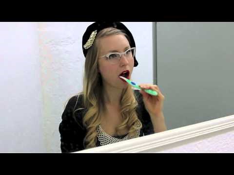 girls brushing their teeth: mandy