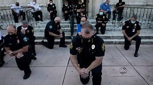 375K views · 9.6K reactions | IN SOLIDARITY: In wake of the nationwide unrest after George Floyd's death, new images show police officers trying to bridge the divide by standing in solidarity with protesters, including officers seen kneeling during a rally in Coral Gables, Florida. David Muir reports. https://abcn.ws/2TX71V1 | ABC World News Tonight with David Muir | Facebook
