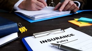 Insurance policy and agent filing in documents.