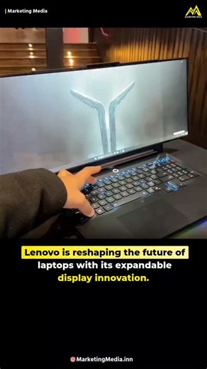 Marketing Media | Startup | Business on Instagram: "Most laptops open. This one unrolls. Meet Lenovo’s Rollable Laptop concept, a bold step toward adaptive hardware. With a single button press, the 12-inch screen smoothly extends upward from inside the chassis, transforming into a 15.3-inch vertical display. Powered by a flexible OLED panel and a motorized roller system, it redefines how screens can behave. This design tackles one of mobile productivity’s biggest problems: limited vertical space