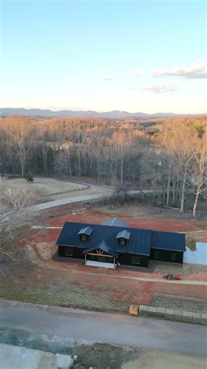 Take a walkthrough of this stunning Aspen 2 barndo in Upstate South Carolina! 🏠🌿 From the sleek black siding and roofing to the vibrant pops of color inside, this home is full of character. And those cedar porches? Perfect for enjoying the spring breeze! If you’ve got land in SC, NC, or East TN and are ready to build your dream home, let's make it happen! 🏡✨ Contact us today! . . . https://thebarndominiumco.com/contact/
