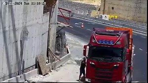 Truck load falls on guy