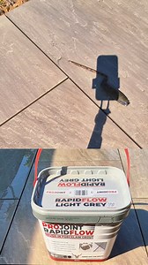 ProJoint Rapidflow from Nexus Pro Systems Ltd 🙌 Compaction is key ⚒️⚒️ (Kandla grey Porcelain tiles) #landscaping #patio #work #pointing #paving #howto #diy #tips #resin #fypシ | LNC Landscapes and Paving