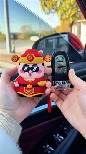 Want to show it for a walk on Instagram: "This super practical car key cover features a cute silicone cartoon God of Wealth design! Not only is it drop- and scratch-resistant, it adds a touch of good fortune and fun to your car keys, bringing you good luck every time you drive! #CarAccessories #CartoonKeyCover #CarKeyProtectiveCover"