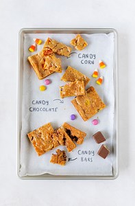 Stuck with too much Halloween candy? Here's a great recipe for sweet & simple squares using leftover candy by modest marce! Find the full recipe at metro.ca/en/recipes-occasions/recipes/halloween-candy-blondies Serves: 24 | Prep: 15 min | Cook: 25 min #MyMetro #falldessert #Halloweencandy #Halloweensnacks #leftoversrecipe #leftoversreinvented #trickortreating #trickortreats | Metro Ontario