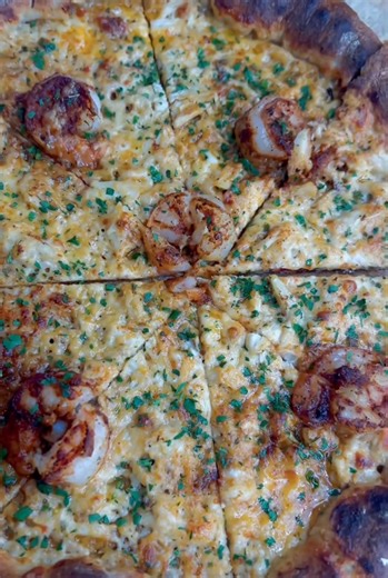 Seafood pizza like no other, crawfish & sausage stuffed goodness