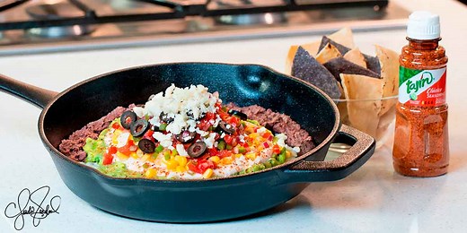 TAJÍN® 7 Layer Dip - TAJIN a unique blend of mild chili peppers, lime and sea salt.