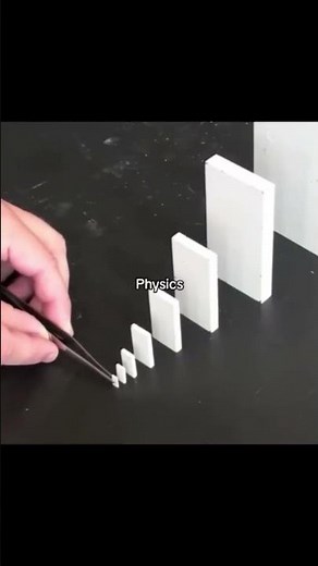 Domino Physics: How Momentum Creates Chain Reactions