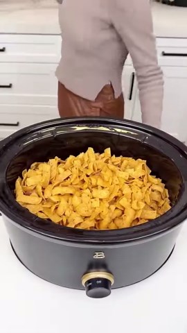 Classic crockpot Frito pie casserole made easy