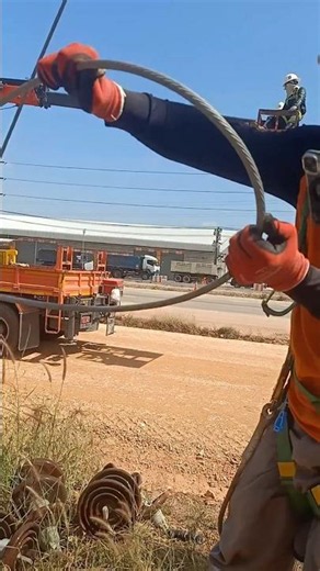 🏗️😱 Amazing Linemen Skills! Pulling Heavy Steel Winch Cable for Power Line Construction #Shorts