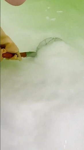 the process of farmers harvesting salt in the ponds #shorts