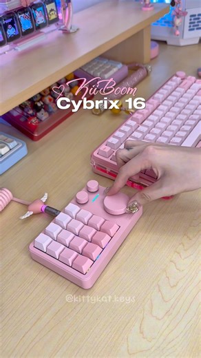 KittyKat 🌸💻⌨️ on Instagram: "🌸 KiiBOOM Cybrix 16 macro pad ✨ It might look small, but it’s honestly such a game changer for my setup 💫 With 16 programmable keys and 3 rotary knobs, it’s perfect for customizing shortcuts - whether I’m editing, organizing files, gaming with macros, or just adjusting music while I work. It also supports VIA programming, so you can easily set up custom functions and layers exactly the way you want. The smooth knobs make volume and timeline control so much easier
