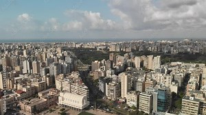 An aerial view of Beirut, Lebanon, highlighting the city's densely populated urban landscape with a mix of modern and traditional architecture.