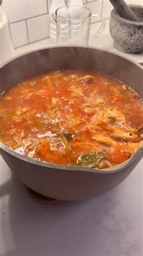 Light Chicken Borscht (with Sauerkraut and Fresh Dill) Ingredients • 1 small whole chicken • 1 small onion, chopped • 2 carrots, grated or sliced • 1 medium beet, grated • 1 cup sauerkraut • 1–2 cups shredded cabbage • 2 cloves garlic, minced • 1 tbsp tomato paste • 2–3 tbsp olive oil • 2–3 bay leaves • Salt, pepper, oregano — to taste • Fresh dill — for serving Instructions 1. Cook the chicken in a large pot with water until tender. Remove the chicken, let it cool slightly, then separate the me