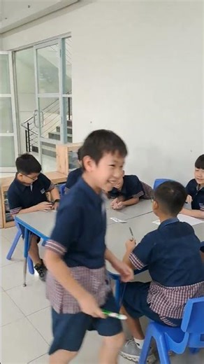 4A Students doing the peer sharing during Music lesson