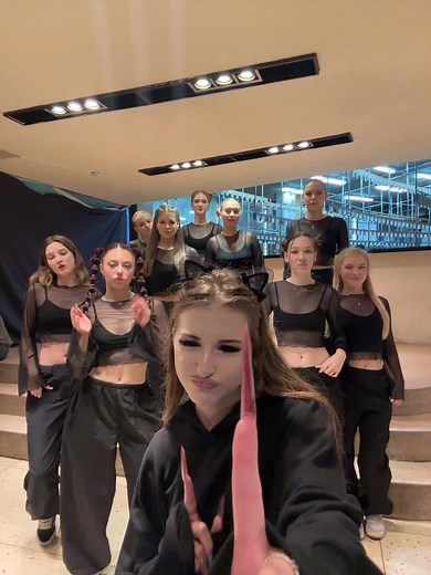 Synchronized Dance Performance in Modern Studio