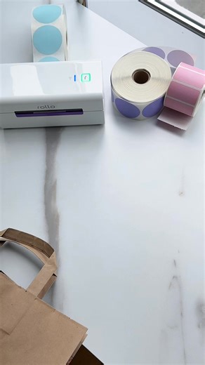 Sustainable gift wrapping on a budget. Print ink-free custom stickers with our wireless printer. | Rollo