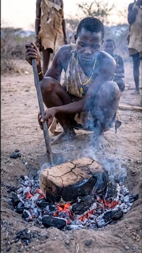 Insane! Hadzabe Cooking Chicken with Mud & Fire 🔥😱 #triballife #tribalfood #shorts