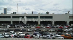 Bangkok, Thailand - August 11, 2018 : Outdoor car parking lot at Morchit train station downtown of Bangkok, Thailand