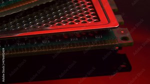 Computer memory RAM module on red light mirror background. Computer hardware, electronic concept. Random Access Memory abbreviated as DDR SDRAM