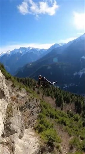 Leap from mountain slide! Not a playground — it’s extreme paradise 🚀 #WingsuitFlying #ExtremeSports