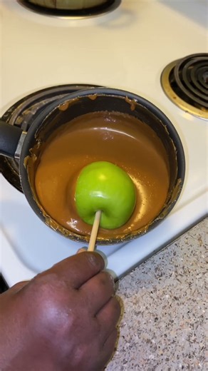 Let me show you how to make caramel candy apples with two ingredients🍎
