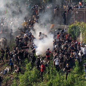 Thousands of protesters waved signs, knelt on the asphalt, and shouted out cries on Philadelphia's Vine Street Expressway early Monday evening. Then, tear gas rained down — marking what may have been the starkest moment yet of the days of unrest in the city. | Philadelphia Inquirer