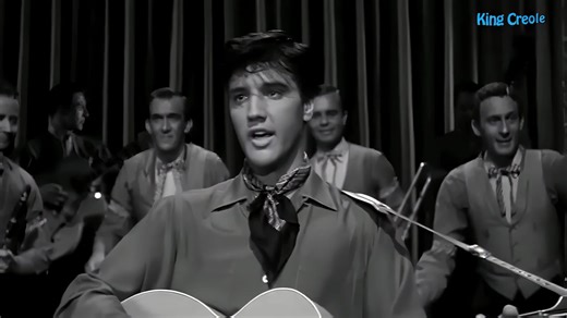 Elvis Presley - King Creole (1958) “King Creole,” released in 1958, is a standout in Elvis Presley’s repertoire, showcasing his versatile artistry and capturing the vibrant spirit of New Orleans. As the title track of the film King Creole, the song offers a rhythmic, colorful portrayal of the city’s rich musical tapestry, where jazz, blues, and rock ’n’ roll converge. The narrative follows 'King Creole,' a charismatic street performer of Creole descent, celebrated for his electrifying rock and r