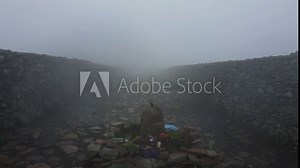 Offering to the rain god Tlaloc, on top of Mount Tlaloc, during a thick fog.