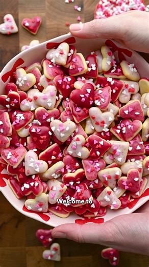 Mini Heart Sugar Cookies for episode 1 of 💕Love at First Bite 💕 A fun little mini series we’re bringing to you this week of cutesy Valentine’s Day recipes! Recipe linked in our profile ❤️ The sugar cookie dough is super easy to make, and we use freeze dried strawberries or raspberries to color the icing. They’re absolutely adorable and make for a fun project!