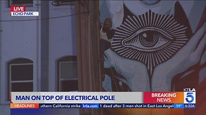 LA street blocked off after man climbs electrical pole, refuses to come down for hours