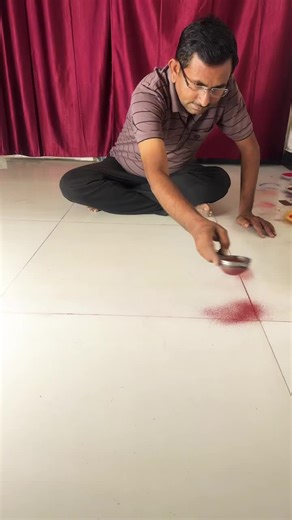 Creating Intricate Designs on Cloth with Red Powder