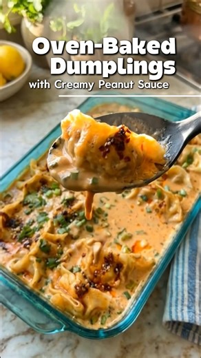 🥟🔥 Oven-Baked Dumplings with Creamy Peanut Sauce – Crispy, Saucy Comfort (Easy Appetizer • Better Than Takeout • Crowd Favorite) These Oven-Baked Dumplings with Peanut Sauce are crispy on the outside, tender inside, and dipped in the most creamy, savory peanut sauce 🤎🔥 No deep frying. No mess. Just golden, oven-baked dumplings that taste like your favorite takeout — but better. Crunchy edges. Warm filling. That silky peanut sauce drizzle. This is snack-time comfort turned all the way up. 🖼️