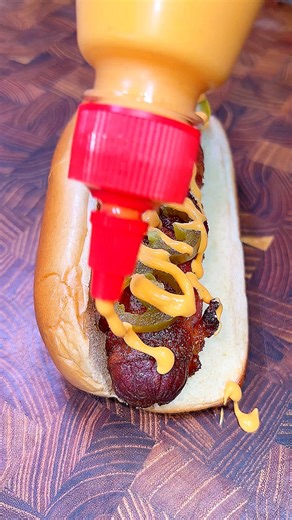 13K views · 240 reactions | The best bacon wrapped hot dog recipe you’ll ever see! Recipe ⬇️ https://cookingintheyard.com/the-best-bacon-wrapped-hot-dog-recipe/ #easyrecipe #bbq #hotdog #grill #bacon #baconwrapped #partyfood #fingerfood | Cookingintheyard | Facebook