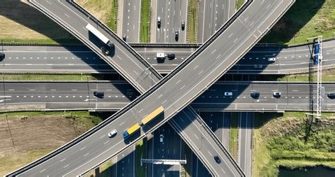 clip-3987499965-aerial-view-multilevel-highway-interchange-busy-car