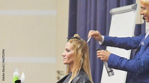 Hairdresser In Action. Barber and customers. hairstyle models for white hair. Blonde in the cabin. Work in the cabin. Barber shears white hair model client. close-up.