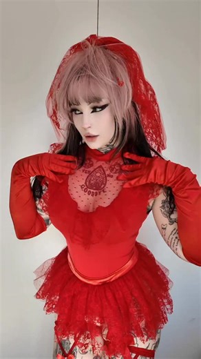 sirena on Instagram: "not my first time being lydia deetz for halloween (i added a throwback pic to my old costume in the lydia pics i posted) why do i kinda love the red tho?!?! ❤️💋🌹🍷🍒💄 • #lydiadeetz #beetlejuice #cosplay #costume #pinkhair #girlswithtattoos #gothgirl #emogirl #altgirl"