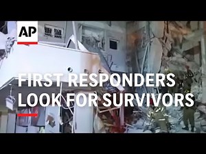 First responders look for survivors after Iranian missile falls near Tel Aviv